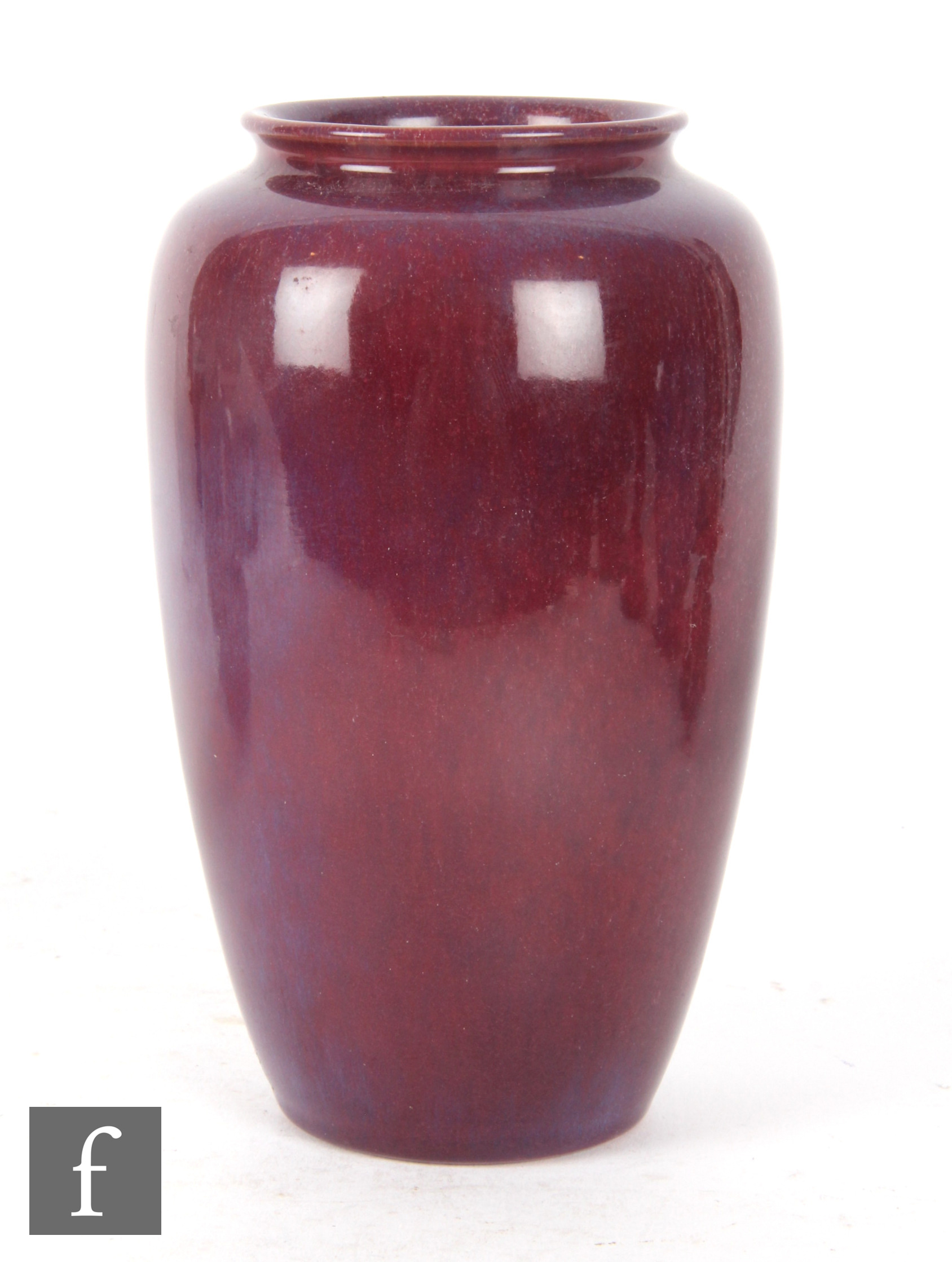 Ashby Potters Guild - An early 20th Century Arts and Crafts vase decorated in an all over deep red