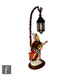 K. Himmelstoss - Rosenthal - An early 20th Century table lamp modelled as Bajazzo, a harlequin stood