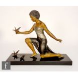 Ugo Cipriani (1887-1960) - An Art Deco 1930s patinated spelter figure of a kneeling lady, the