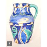 Clarice Cliff - Inspiration Persian - A single handled Lotus jug circa 1930, hand painted with a