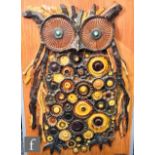 Williamson - A 1960s pottery plaque of a stylised owl with textured and patterned decoration, the