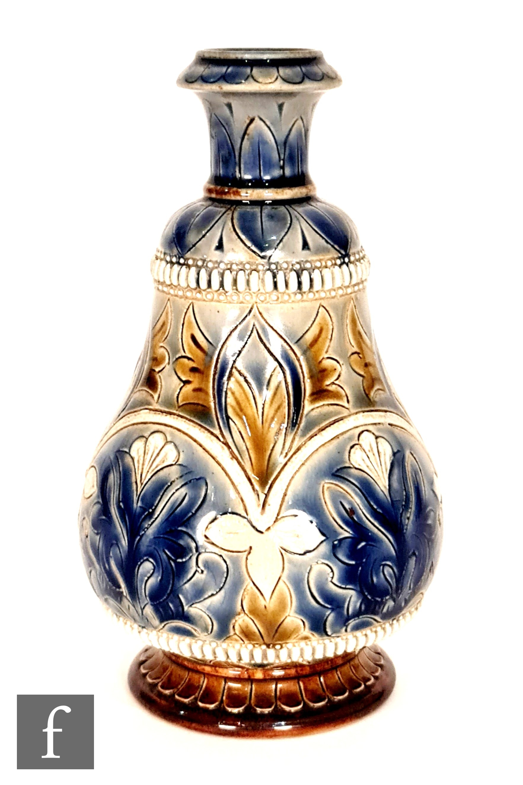 Doulton Lambeth - A late 19th Century vase decorated with incised stylised flowers and foliage in