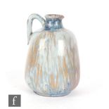 Ashby Potters Guild - An early 20th Century Arts and Crafts flower jug, the slightly bulbous body