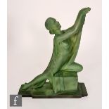 Unknown - In the manner of Leonardo - A 1930s Art Deco ceramic figure of a semi-clad kneeling