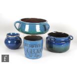 C.H Brannam - Four pieces of early 20th Century Arts and Crafts comprising a mug incised