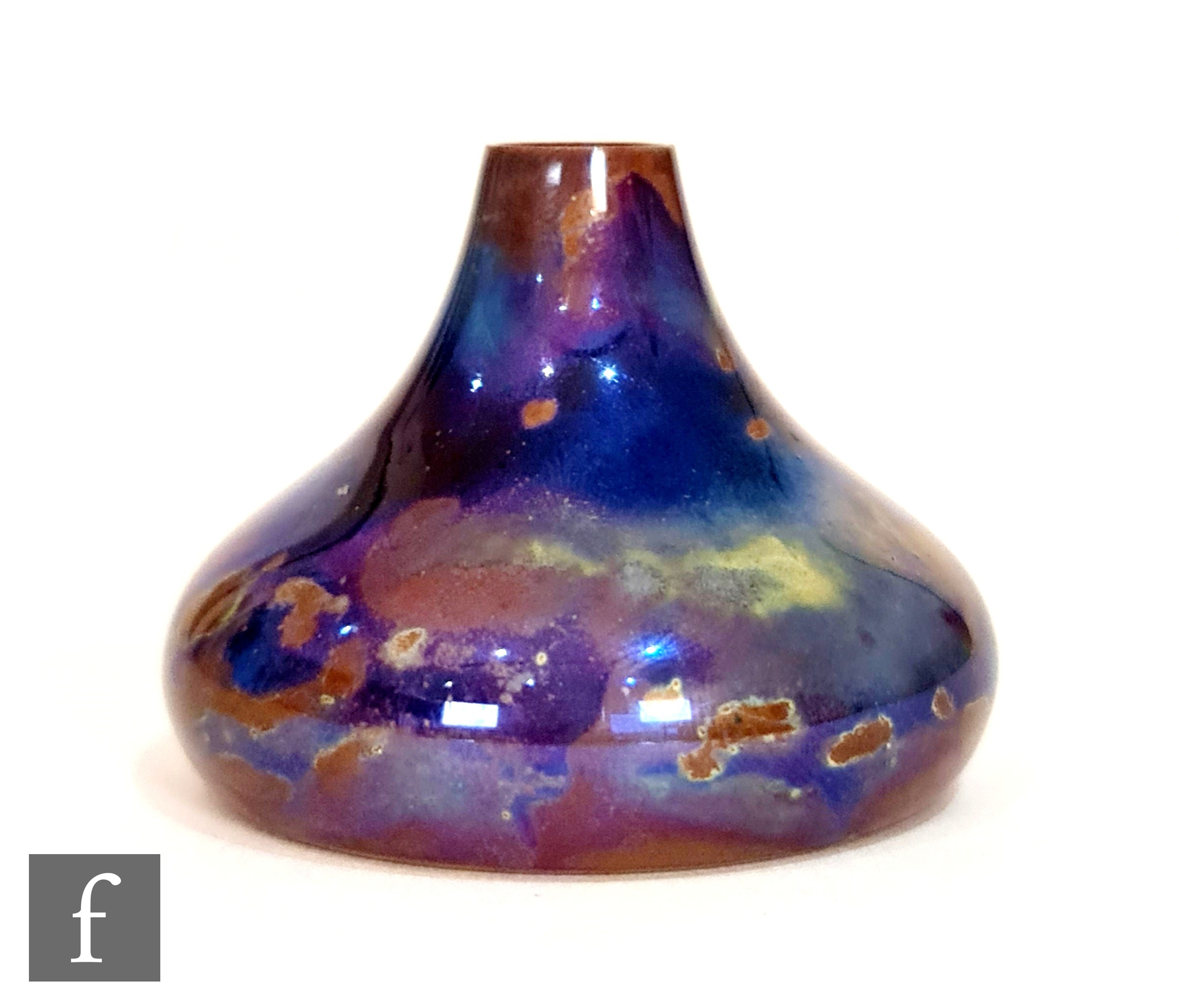 Bernard Moore - A small early 20th Century squat vase decorated in an iridescent flambe glaze with