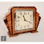 Unknown - A 1930s Art Deco mantle clock, the oak veneered square section clock flanked by fan shaped