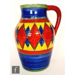 Clarice Cliff - Original Bizarre - A single handled Lotus Jug circa 1928, hand painted with a