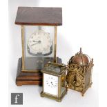 An early 20th century French Bulle oak cased mantle clock with open pendulum, height 26.5cm, a small