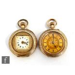 An early 20th Century 14ct crown wind fob watch with a similar 9ct example, both with metal dust
