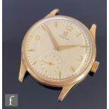 A gentleman's 9ct hallmarked Omega wrist watch, Arabic numerals and batons to a cream circular dial,