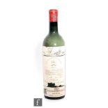 A bottle of 1955 Chateau Mouton Rothschild No 042,666.