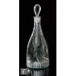 An early 19th Century glass decanter, circa 1810, of tapering form with a scallop cut neck and basal