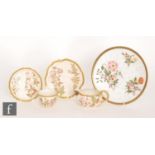 A late 19th Century Royal Worcester blush ivory trio in the Aesthetic taste decorated with flowers