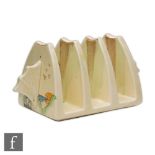 A Clarice Cliff Taormina pattern toast rack circa 1935, hand painted with a stylised tree