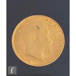 An Edward VII full sovereign dated 1910.