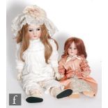 Two bisque socket head dolls, a Simon and Halbig doll with sleeping brown eyes, open mouth with