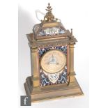 A late 19th French champ leve enamelled mantle clock named S D Neill Limited Belfast, on pillared