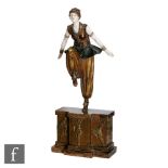 Demetre Chiparus - The Oriental Dancer - A patinated, gilt and silvered bronze figure with ivory