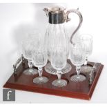 A later 20th Century Thomas Webb & Sons crystal glass decanter set with a footed swollen claret with