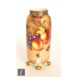 A later 20th Century Royal Worcester Fallen Fruit vase decorated in the round by Freeman with hand