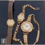 Three lady's 9ct wrist watches to include an early 20th Century example and two later examples,