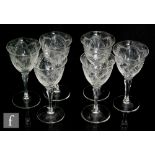 A set of six 20th Century drinking glasses, each with an ogee bowl cut with fans, arches and