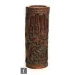 A Chinese carved bamboo brush pot, bitong, late Qing Dynasty (1644-1912), of cylindrical form,