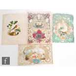 Four Victorian Valentines day cards, the first decorated with applied scraps and flowers against a