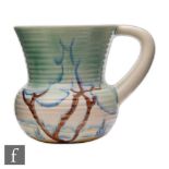 A Clarice Cliff Gloria Bridge shape 635 jug circa 1930, hand painted with stylised river landscape