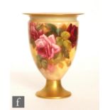 A Royal Worcester pedestal vase, shape 2638 panel decorated by Sedgley with hand painted roses,