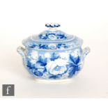 A small 19th Century Wedgwood tureen and cover decorated in a blue and white transfer print with