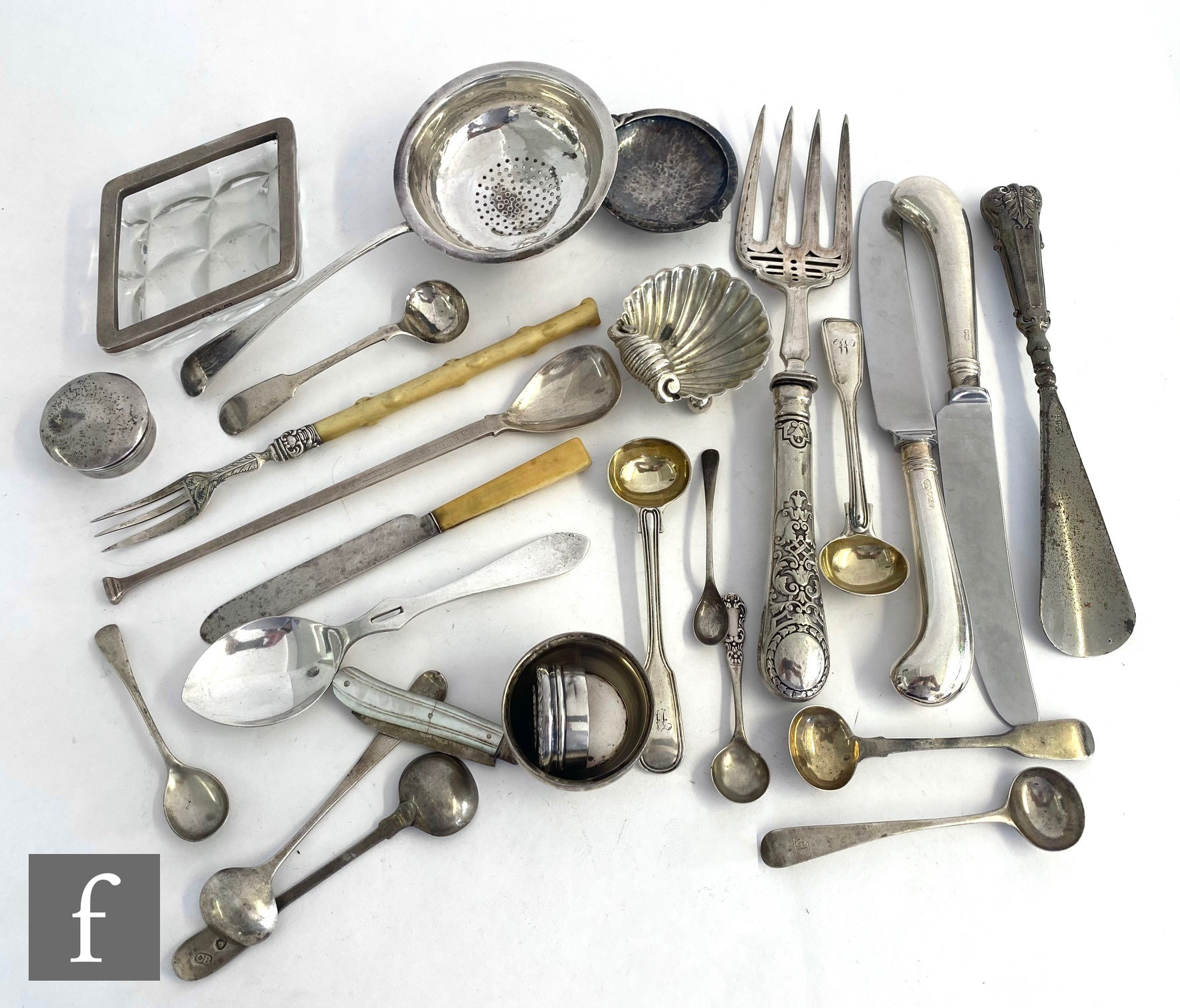 A parcel lot of assorted hallmarked silver items to include spoons, pistol grip knives, rouge