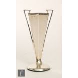 A hallmarked silver bud vase of footed form with flared diamond form body and applied twin angular