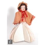 An early 20th Century German fortune telling doll, circa 1920s, the Johann Walther & Sohn bisque