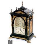 A late 19th century ebonised bracket clock by Barwise London, the silvered arch dial incorporating