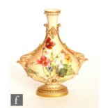 An early 20th Century Royal Worcester blush ivory shape 2125 vase decorated with hand painted wild