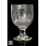 A 19th Century glass rummer, circa 1855, the cup bowl engraved with a cartouche with a sailing pilot
