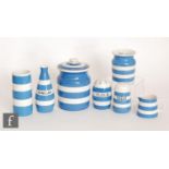 A collection of assorted T.G Green Cornish Ware comprising two storage jars, a utensils cylinder,