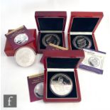 Four five ounce silver ten pound coins to commemorate Douglas Bader, The Battle of Britain,