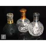 Three early 20th Century Lampe Berger fragrance lamps, to include an Art Deco example of
