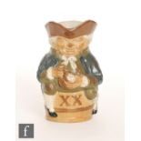 An early 20th Century salt glazed Royal Doulton Lambeth Toby XX character jug, he sat on a barrel