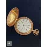 An early 20th Century gold plated Waltham crown wind full hunter pocket watch with part engraved
