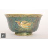 A 1930s Wedgwood 'Ordinary Lustre' footed bowl decorated in the Z5088 pattern with exotic birds in