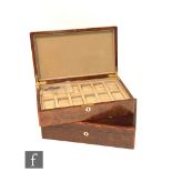 Two modern rectangular lacquered burr walnut watch boxes each with twelve compartments, length 37cm,
