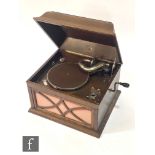 An HMV oak cased table top gramophone, width 44cm.