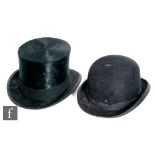 A black felt an leather lined top hat and a Dunn & Co bowler hat, 20cm x 16cm. (2)