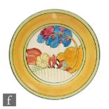 A Clarice Cliff Moonlight pattern circular plate circa 1933 hand painted with a stylised tree and