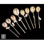 A collection of 19th Century Russian silver coffee spoons, each of varying design with engraved