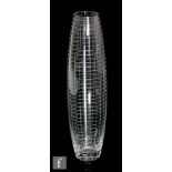 A contemporary glass vase of swollen sleeve form, engraved with a grid pattern to the entirety,